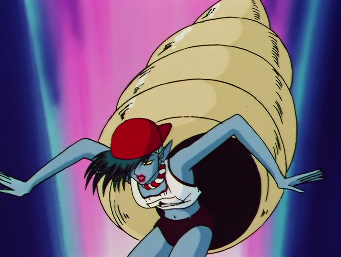 U-Ndokai, a Daimon from Sailor Moon episode 117. She has light blue skin and spiky dark greenish hair emerging from under a backwards red baseball cap. It’s another undercut kind of situation, as we can see that the back of her head is shaved. She’s wearing a white runner’s shirt and dark red bloomers. Also, she has a huge turban shell attached to her back. It’s not really clear how it’s attached, it’s sort of just hanging there.